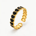 ANILLO NEGRO CORAZONES